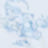 A blurry, abstract blue shape floats in a light space. The details are indistinct and the image is out of focus.