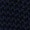 Close-up of a dark, textured knit fabric showcasing its repeating woven pattern.