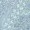 Close-up view of a galvanized metal surface featuring a mottled, industrial pattern in shades of gray and silver.