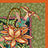 A colorful embroidered design featuring an orange flower and a bird against a green patterned background with an orange border.