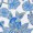 Blue and white floral pattern featuring various leaves and flowers overlapping in a vibrant arrangement.
