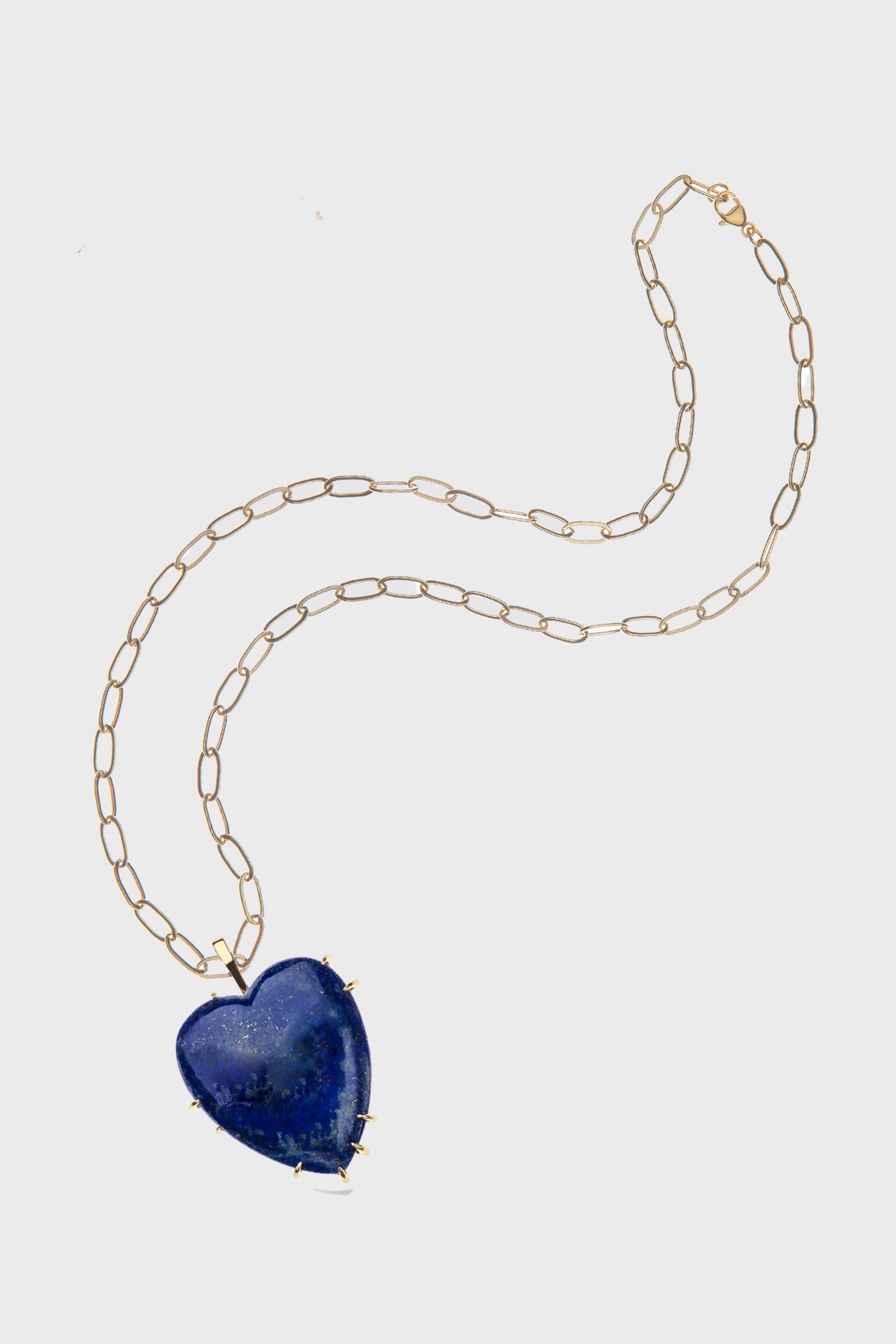 Jane Win gold chain necklace featuring an oversized heart pendant with a large blue stone, crafted from 14k gold-plated sterling silver.