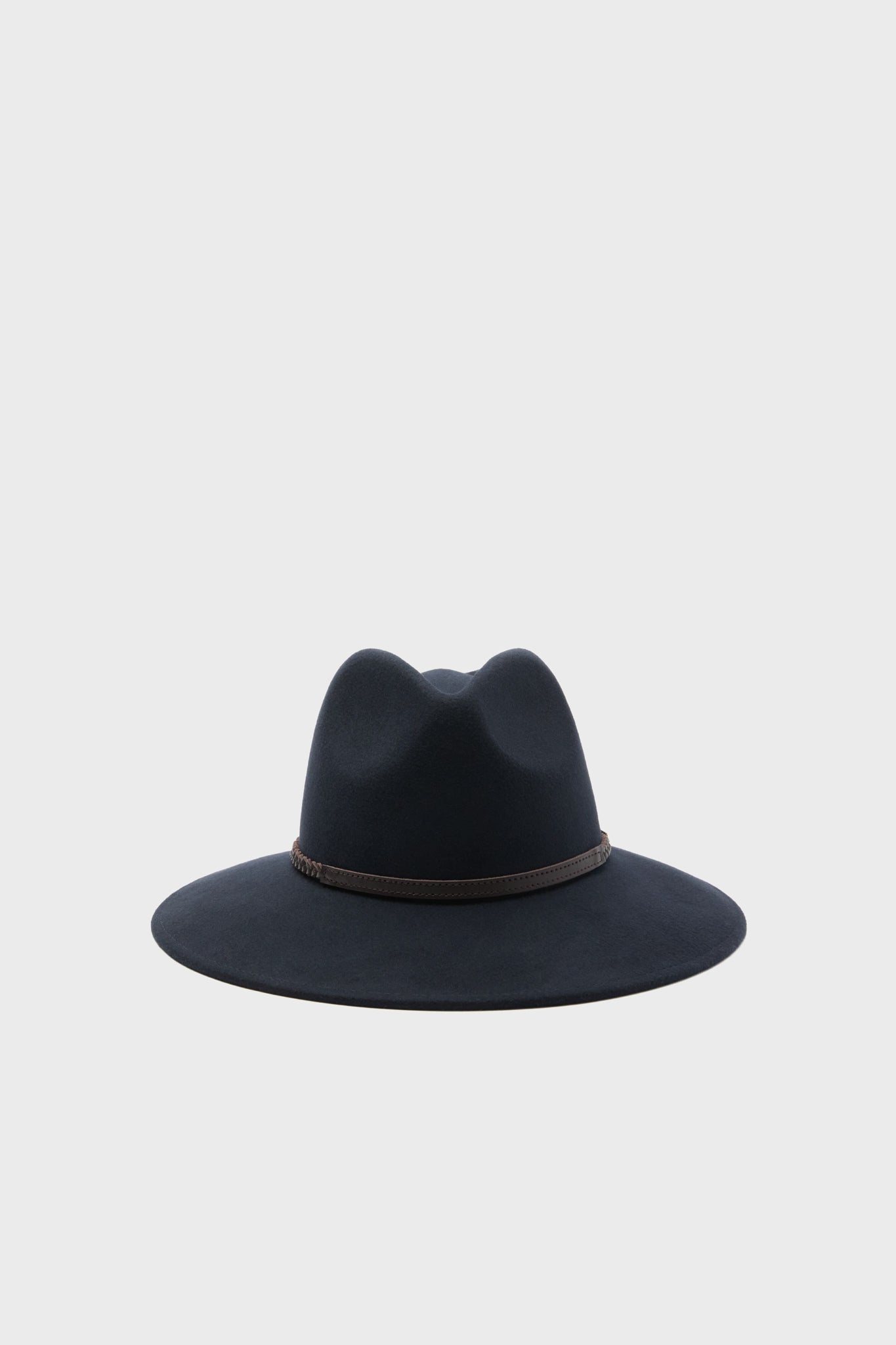 The Barbour women's hat is a wide-brimmed black felted wool fedora with a brown cord band, featuring an equestrian-inspired design.