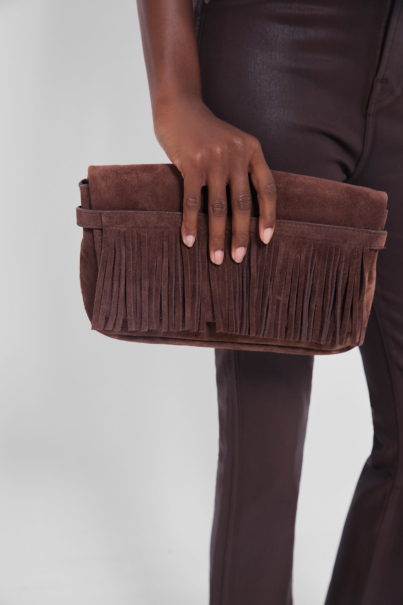 Hudson’s vintage brown suede clutch top