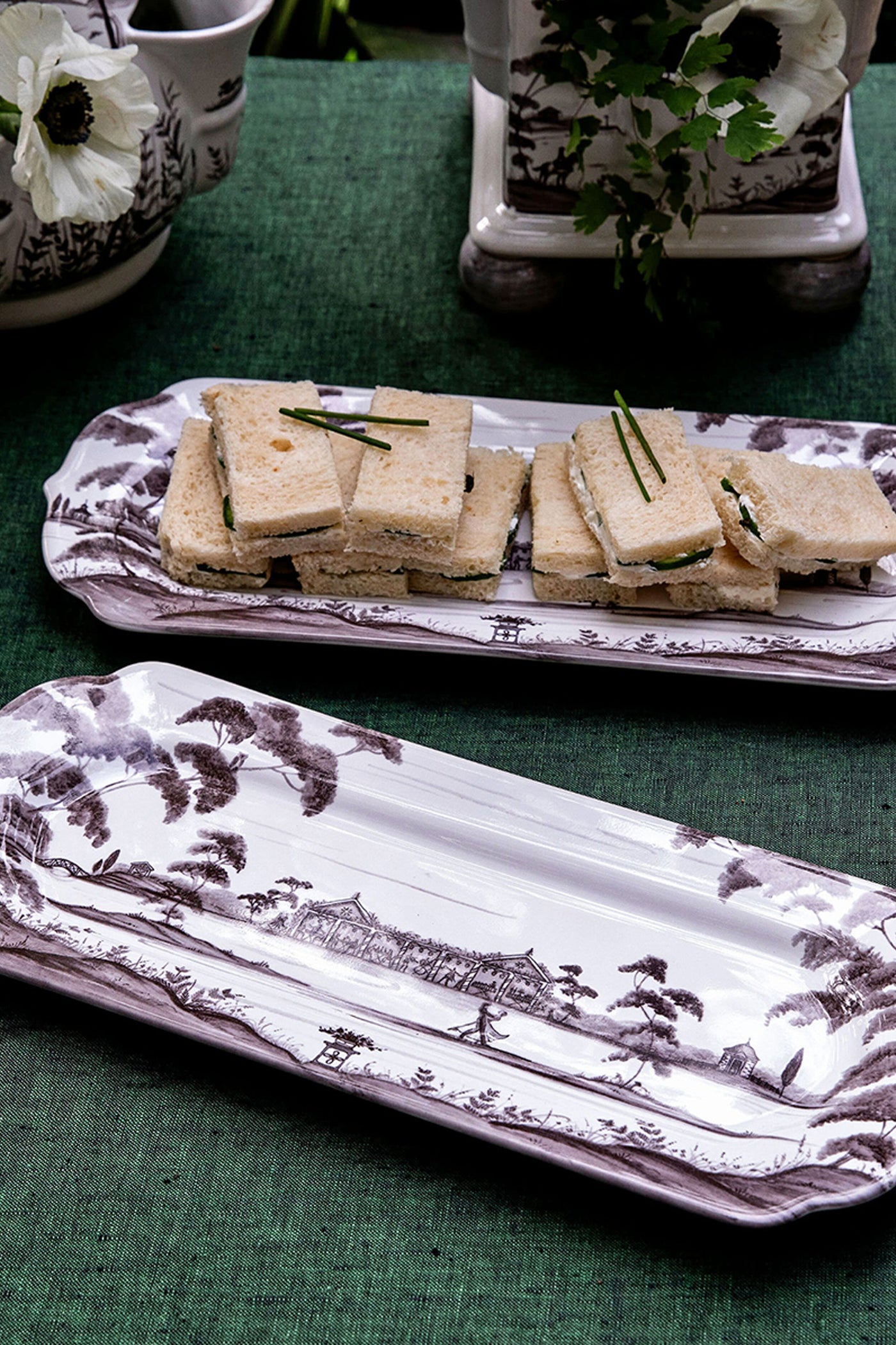 Country Estate 15 Hostess Tray - Flint Grey, featuring a classic pastoral motif, elegantly displays finger sandwiches, embodying effortless sophistication and high-end dining. Ideal for fun gatherings.
