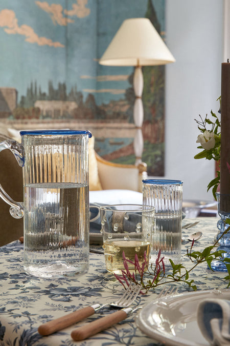 White Dots Party Tumbler (Set of 6) elegantly showcased on a dining table, embodying classic, effortless style with handcrafted glassware for a fun, high-end dining experience.