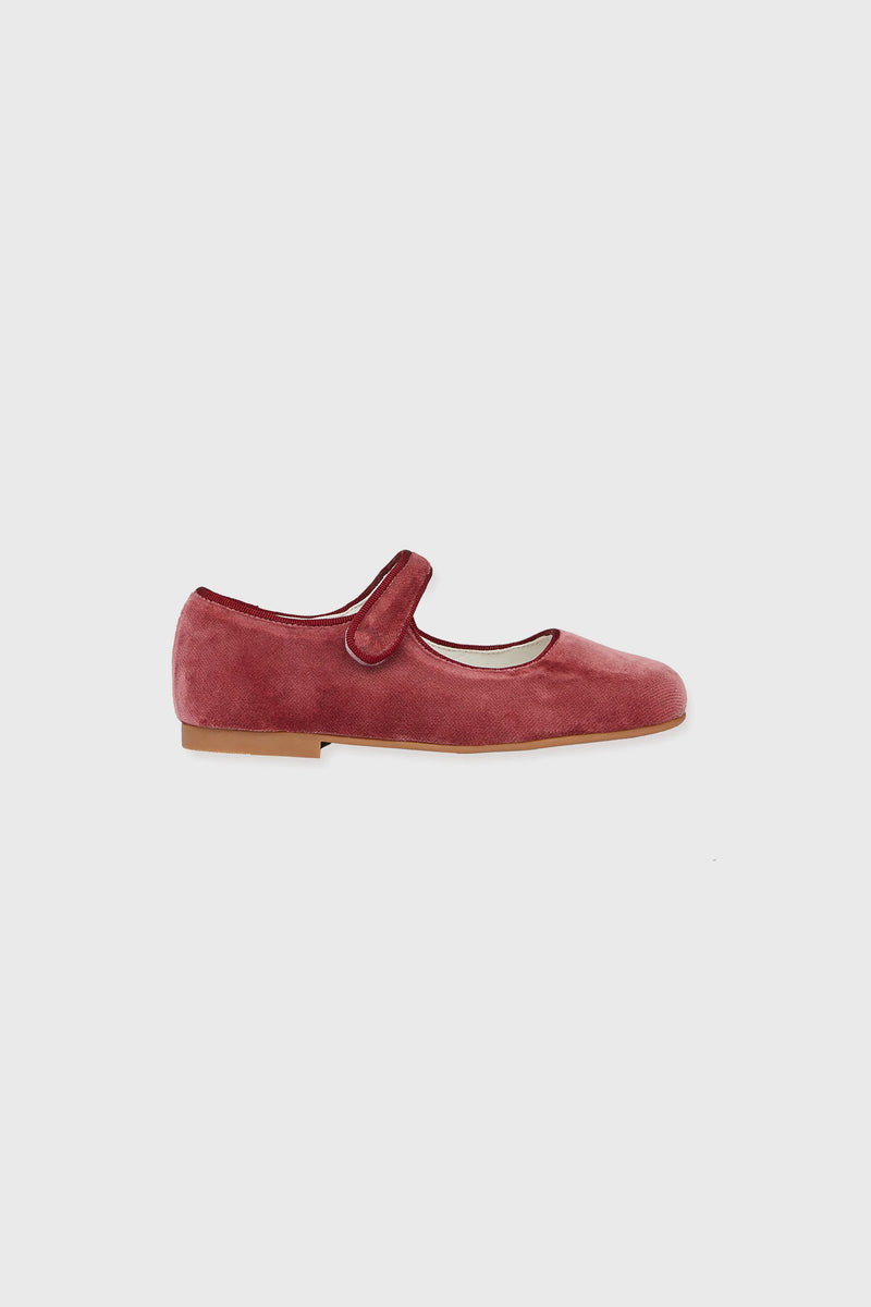 Dusty Pink Girl Velvet Mary Janes, a classic, high-end flat shoe in soft velvet, featuring an effortless velcro strap and fun grosgrain trim for all-day comfort.