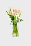 Ella 6 Corset Vase features a classic, hourglass design with decorative raised bands, effortlessly showcasing blush-white tulips for a fun, high-end look in small spaces.