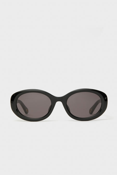 Chloe Marcie black oval sunglasses featuring dark lenses, designed for effortless style.