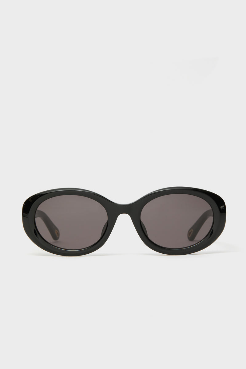 Chloe Marcie black oval sunglasses featuring dark lenses, designed for effortless style.