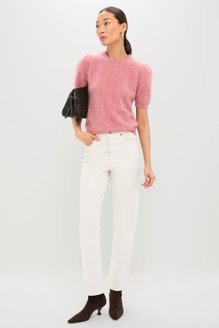 Model wears the Dusty Rose Brushed Merino Wool Puff Sleeve Lexie Sweater, paired with classic ivory jeans and high-end suede boots, exuding an effortless and fun style.