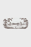 Juliska rectangular porcelain serving tray featuring a black pastoral landscape with trees and a central building, crafted in the style of Portuguese stoneware.