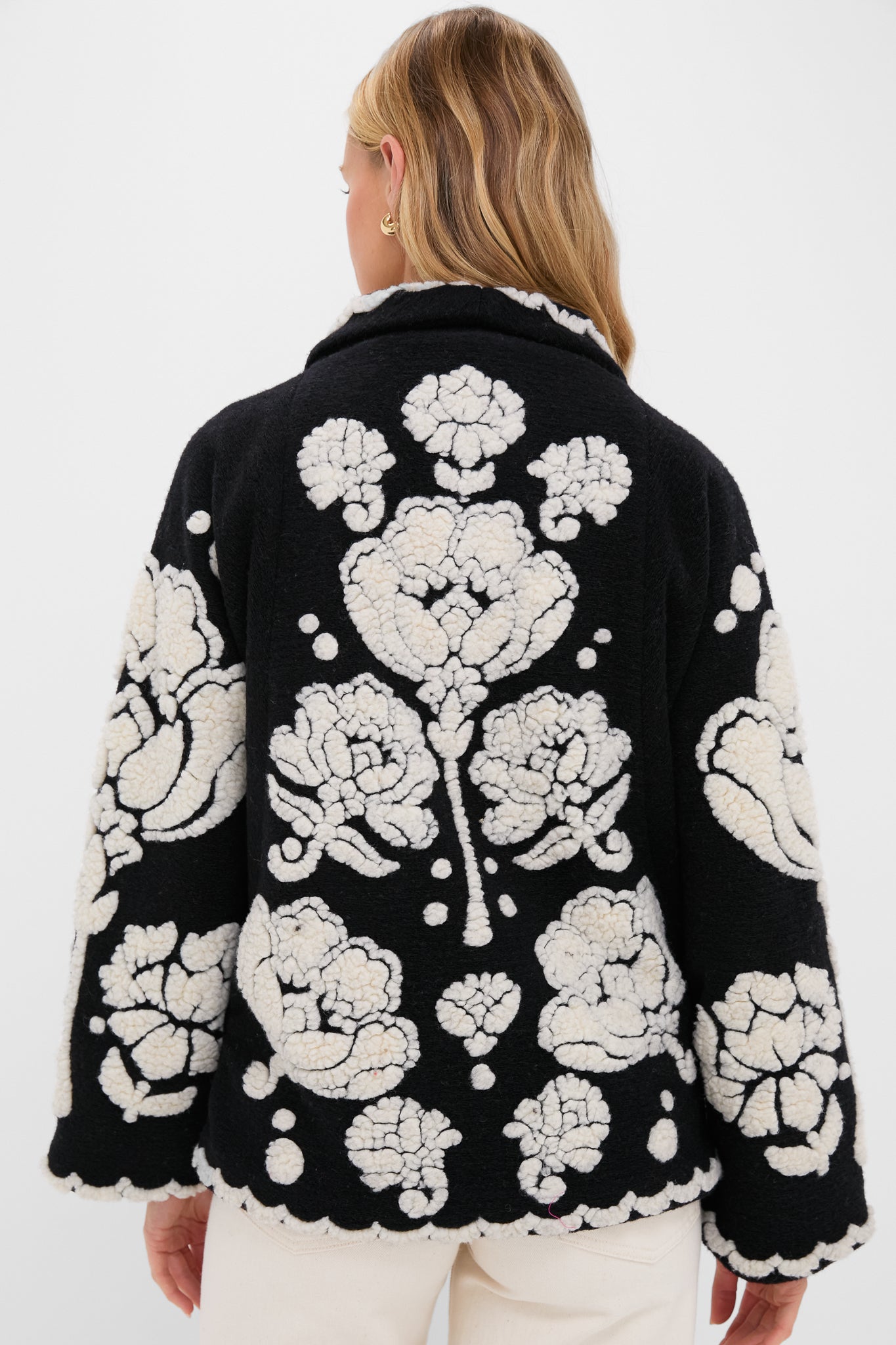 Black Cream Floral Arabesque Fleece Coat with textured floral motifs, open front, and shawl collar. An effortlessly classic piece for high-end, fun layering.