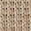 Close-up of a woven fabric featuring a beige and brown chevron design with intricate texture.