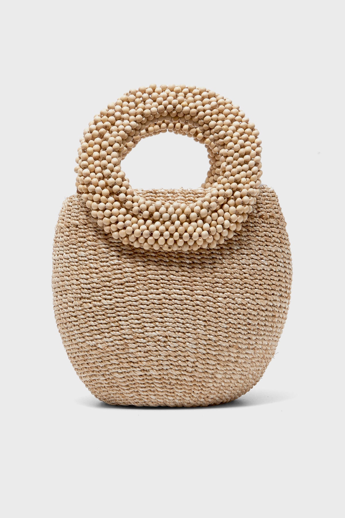 The Aranaz woven raffia bag features a rounded body and a circular wooden-bead handle, making it a standout statement piece for handmade accessory lovers.