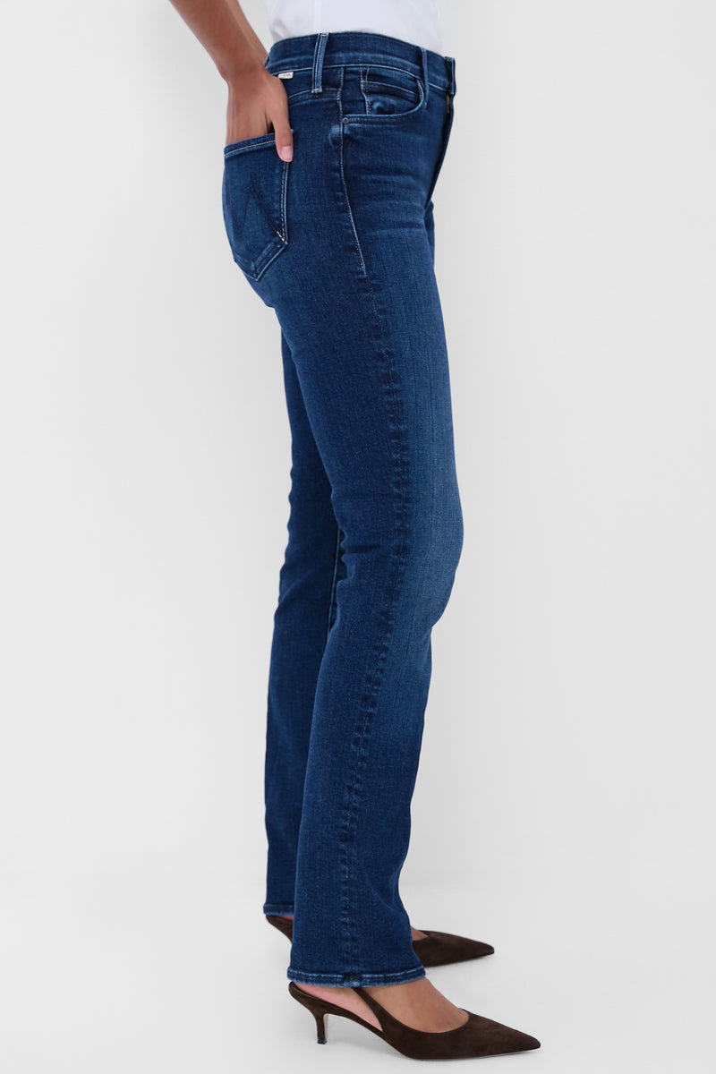 You're a Riot The Rascal Skimp jeans in dark blue, featuring a classic mid-rise and straight leg, paired effortlessly with brown pointed-toe shoes for a high-end, fun look.
