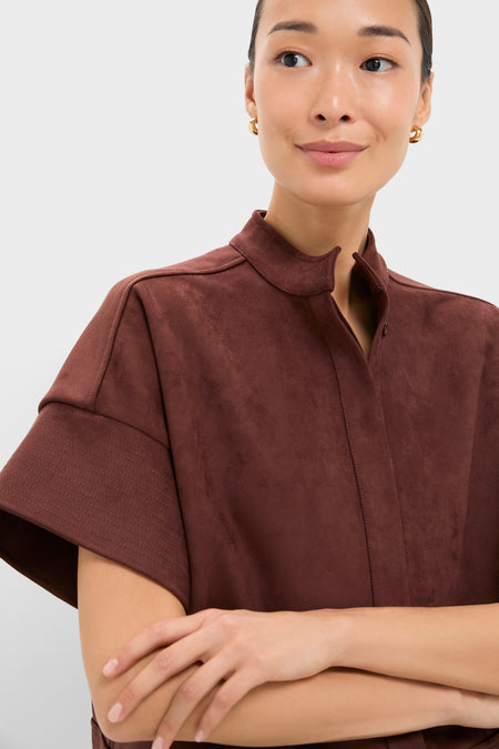 Young woman models the Ganache Vegan Suede Trapunto Stitch Sofia Shirt, a classic and effortless short-sleeve top with trapunto stitching, embodying a high-end, fun style.