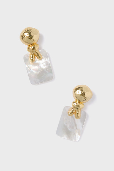 A pair of Tuckernuck Jewelry Jaqueline Earrings with gold-toned hammered metal tops and rectangular, iridescent Mother of Pearl dangles.