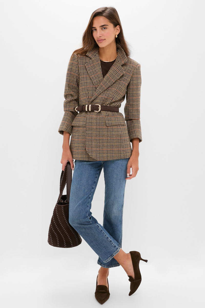 Model wearing Chocolate Suede Morgan Heels, paired with a plaid blazer and jeans. The classic, pointed-toe design adds an effortless, high-end touch to any outfit.