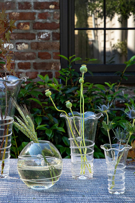 Amalia 6 Flared Vase, wrapped in decorative metal bands, elegantly showcases botanical stems, embodying classic, effortless, and high-end style for a fun, sophisticated touch.