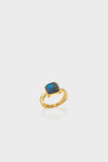 Classic Blue Labradorite Mystic Eye Gem Ring with a hammered gold band, effortlessly elegant and fun, embodying high-end style with a unique cushion-cut stone setting.