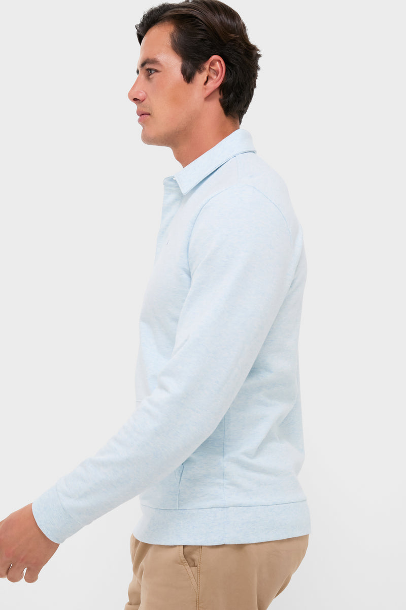 Young man in a classic, heathered ice collared sweatshirt with rugby details, effortlessly styled for a high-end, fun look.