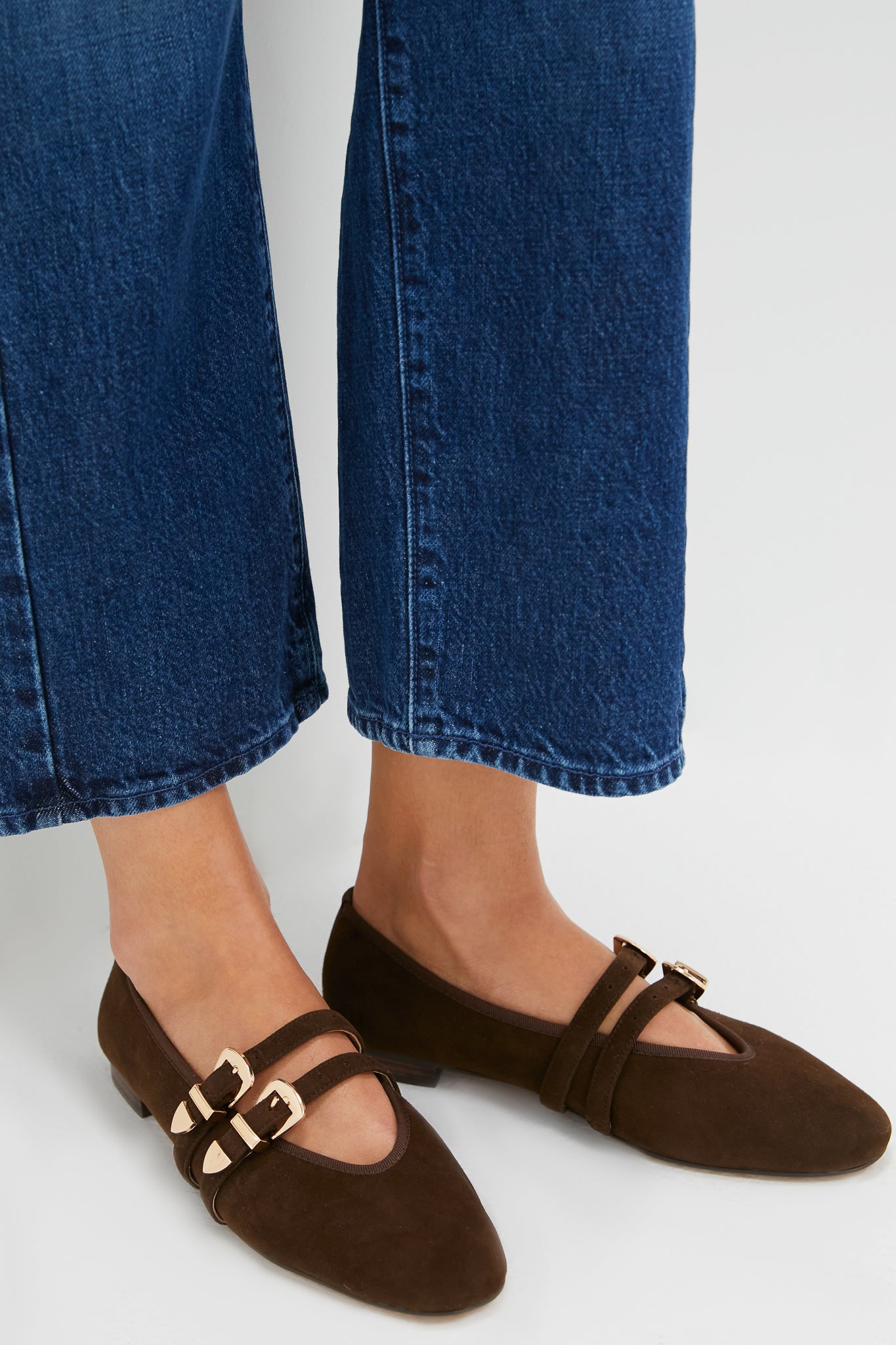 Classic and effortless, the Chocolate Suede Buckle Nina Flats feature a pointed toe, double gold-tone buckles, and pair perfectly with wide-leg jeans for a high-end, fun look.