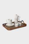 Navy Danish Stripe 18 Tray elegantly holds a classic white ceramic tea set, featuring textured mugs, a pitcher, and a sugar pot, perfect for effortless, high-end entertaining.