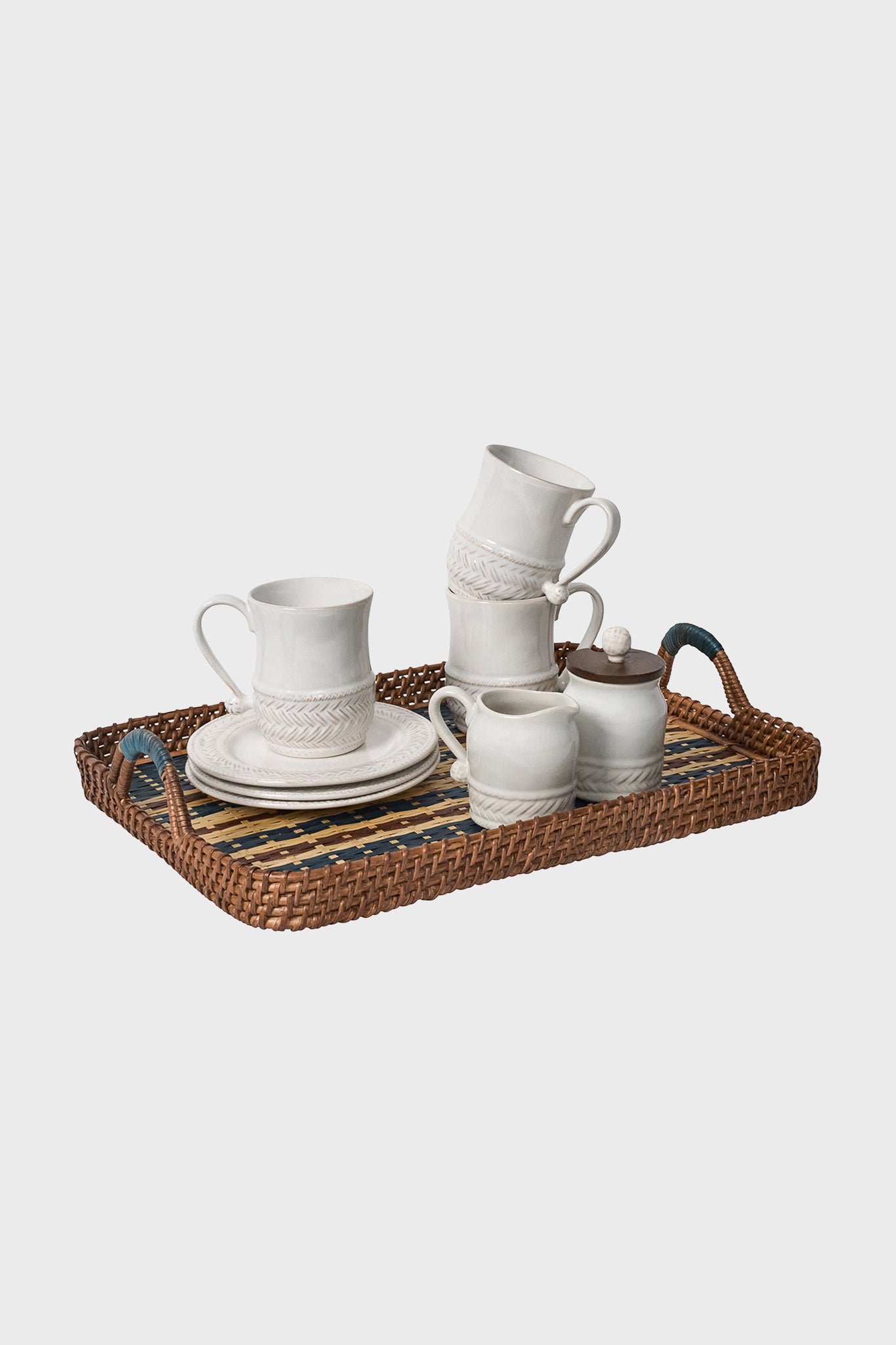 Navy Danish Stripe 18 Tray elegantly holds a classic white ceramic tea set, featuring textured mugs, a pitcher, and a sugar pot, perfect for effortless, high-end entertaining.