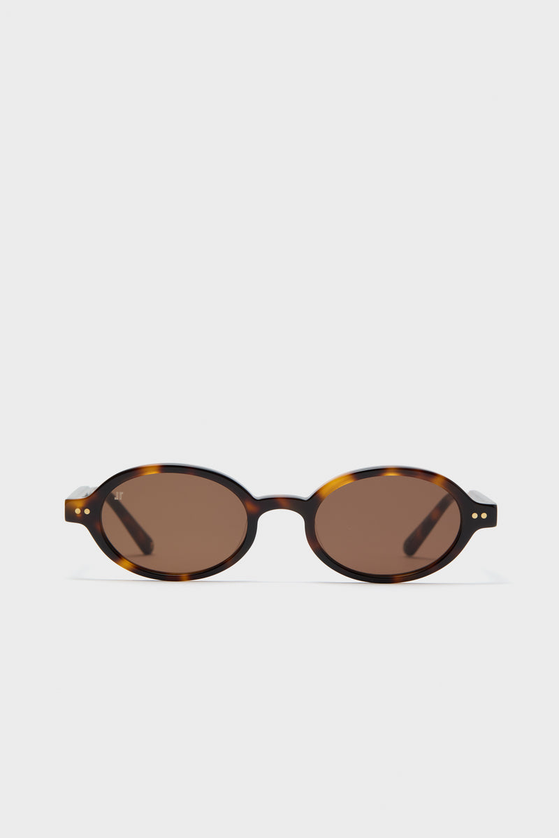 Jimmy Fairly luxury tortoise sunglasses featuring oval-shaped frames and brown lenses, perfect for a timeless style.