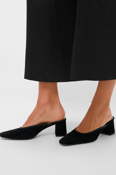 Black Suede Tilda Mules with an elongated square toe and block heel, offering an effortless, classic look; perfect for adding a high-end touch to any outfit.