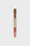 Soft Tortoise Natural Bristle Toothbrush by C.O. Bigelow, featuring classic wood-grain handle, effortless design, and high-end natural bristles in a clear travel sleeve.