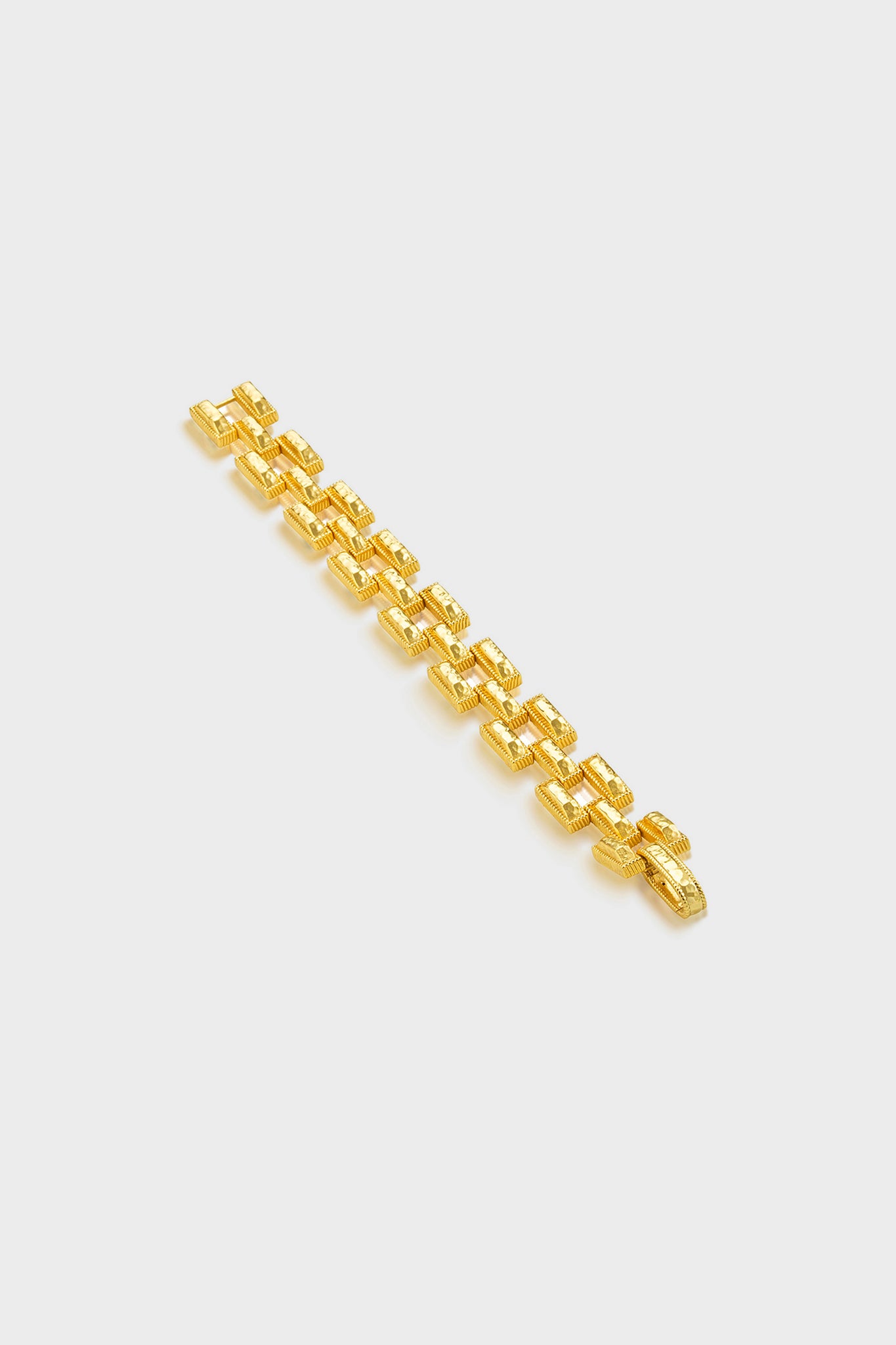 Pathway Petite Link Bracelet in Gold, featuring classic interlocking rectangular links with a textured, decorative surface, offering an effortless, high-end style for fun, daily adventures.