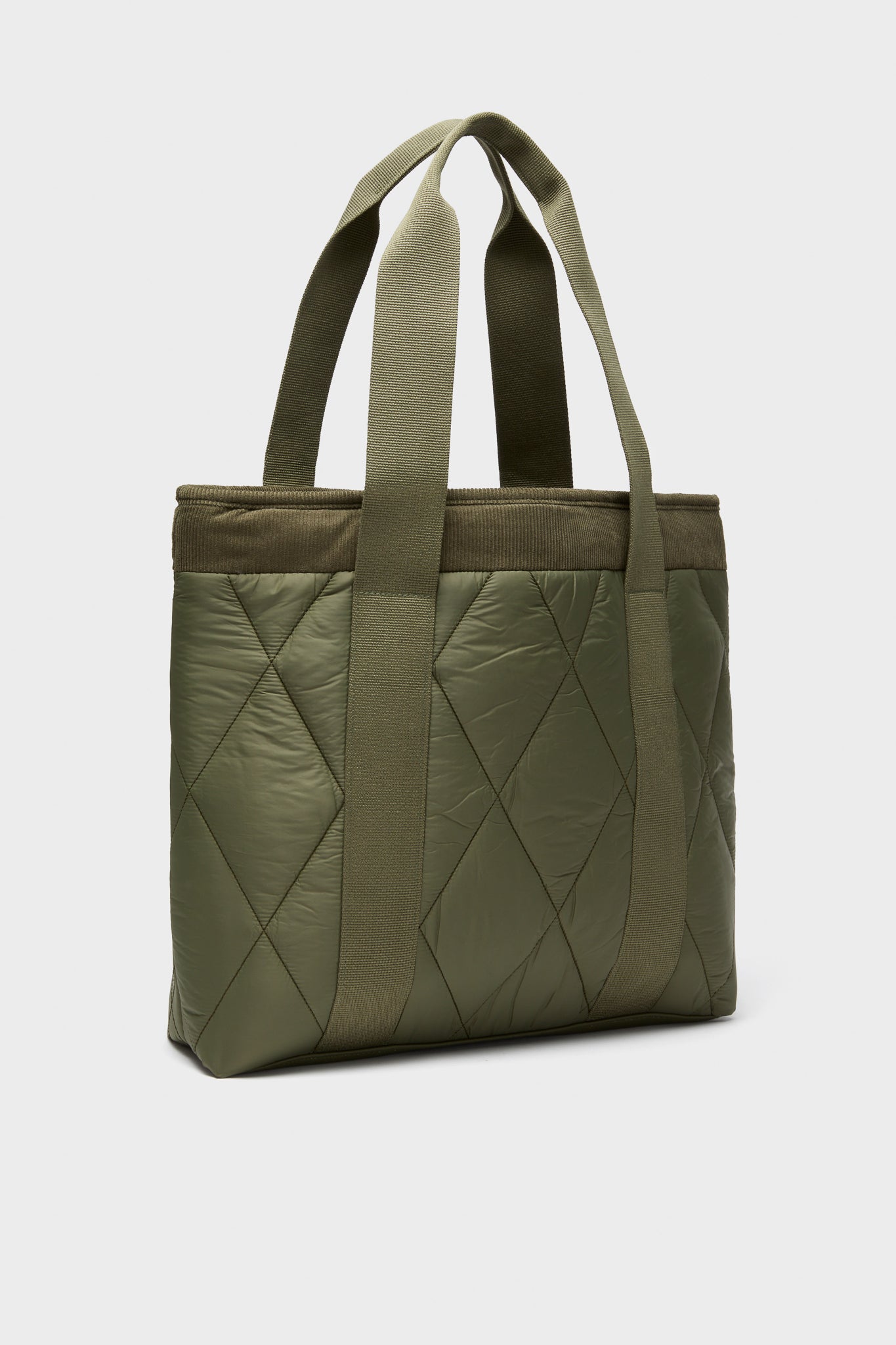 Olive Healy Tote Bag: A classic, high-end accessory with diamond quilting and effortless design, featuring webbed handles and ample space for essentials.