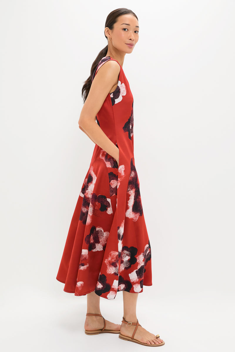 Crimson Red Water Floral Cosmic Midi Dress: A classic, effortless design featuring abstract floral patterns and a flared skirt, paired with tan sandals for a fun, high-end look.