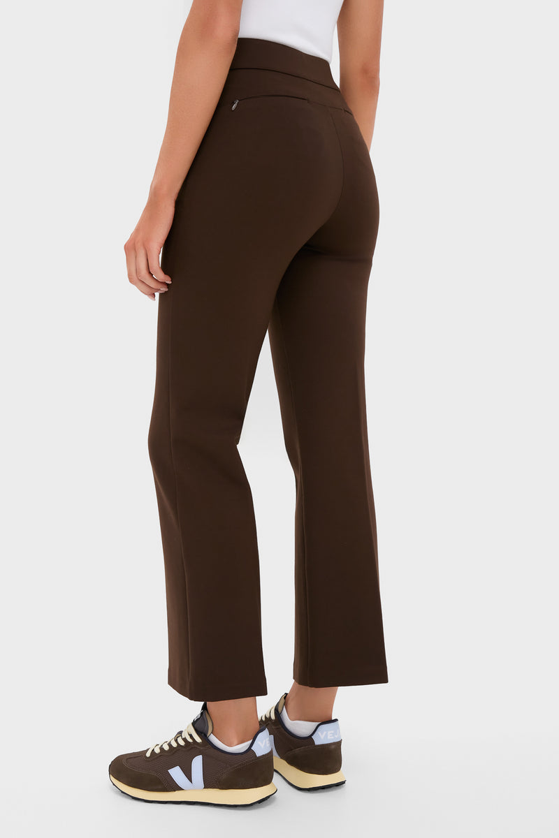 Chocolate Brown 28 Inch Compression September Pant, a classic and effortless high-waisted, slim-bootcut style paired with fun, high-end sneakers and a tucked-in top hem.