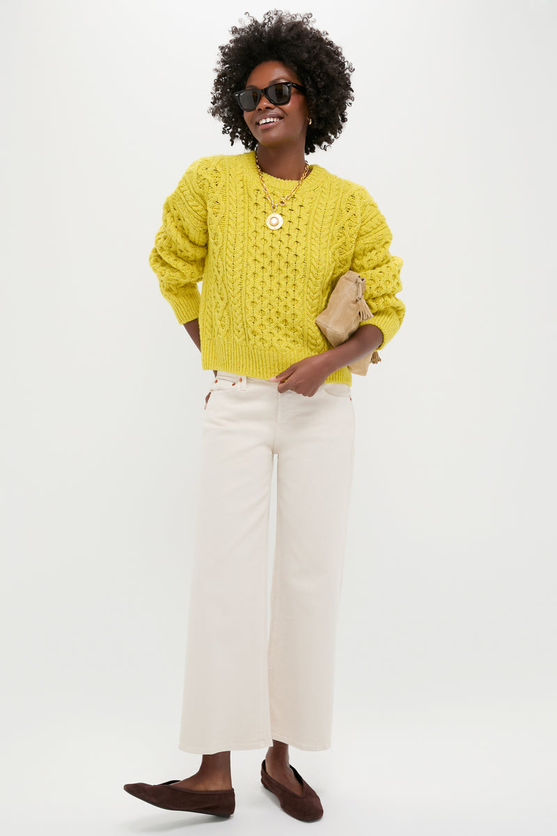 Person models classic, effortless style with Seal Brown Courtney Flats, featuring a squared-off toe, suede finish; paired with chic outfit for a fun, high-end look.