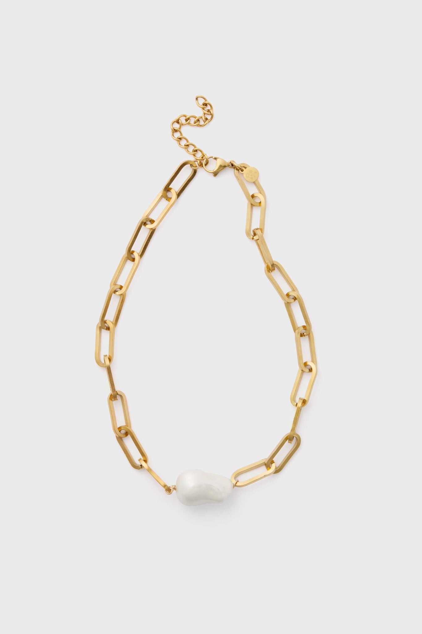 The Petit Moments Gold Elizabeth Necklace features large gold-tone rectangular links and a single irregular white pearl pendant for an elegant look.