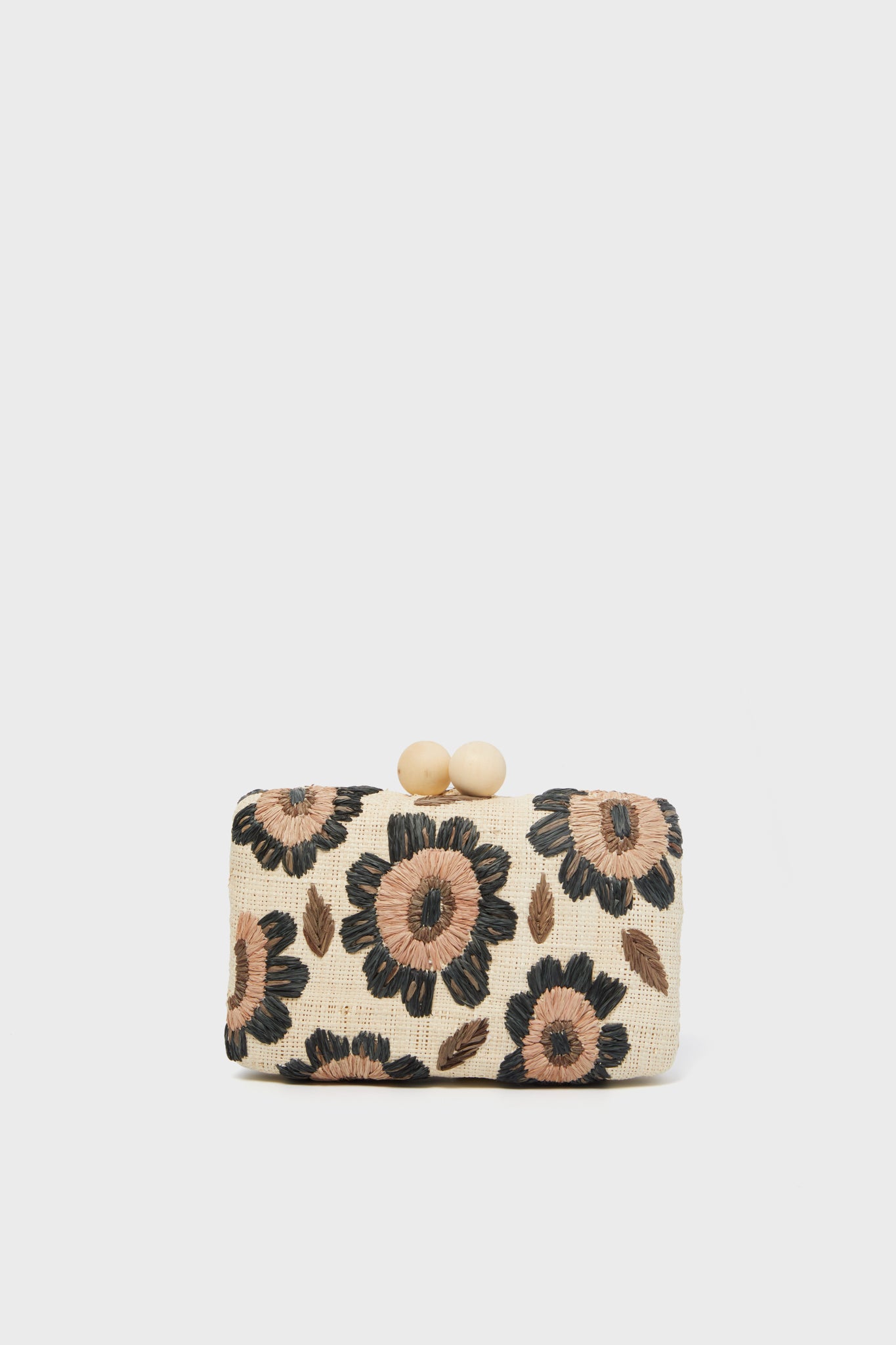 Kayu rectangular hand-embroidered clutch with black and brown floral designs, topped with a clasp featuring two round beige beads—a beautiful, sustainable accessory choice.