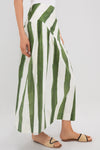 Classic Green Stripe Nature Midi Skirt with drop waist and A-line silhouette, exuding effortless style. Paired with woven sandals for a fun, high-end look.