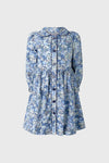 Long Sleeve Floral Button-Front Dress featuring a classic Peter Pan collar and gathered skirt in a playful blue-and-white floral print for an effortless, high-end style.