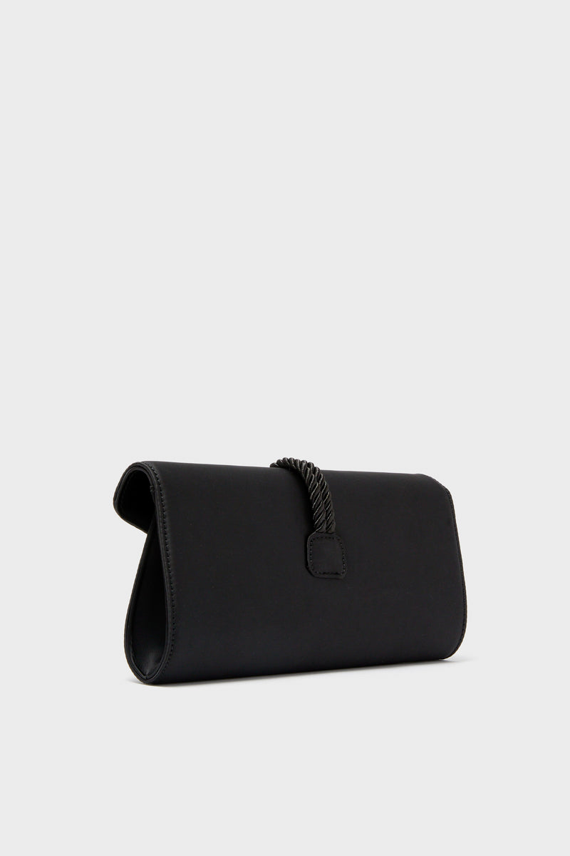 Black Satin Gabrielle Clutch with a classic envelope silhouette, featuring an effortless braided tassel detail and magnetic snap closure, perfect for high-end, fun evenings out.