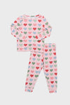 Pink Small Hearts Kids Bamboo Pj Set features a classic, effortless two-piece design with a fun heart pattern, crafted from high-end, breathable bamboo for ultimate comfort.