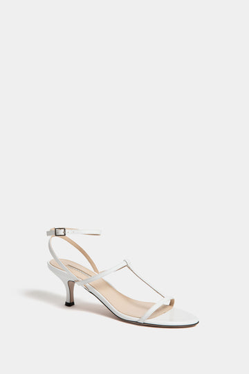 A single Emilia Wickstead White Novie Leather Kitten Heel sandal featuring an open toe, T-strap design, and ankle buckle strap in the brand’s signature style.