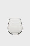 Juliska clear stemless wine glass featuring three horizontal textured bands around the upper half, crafted in a sleek bohemian style.