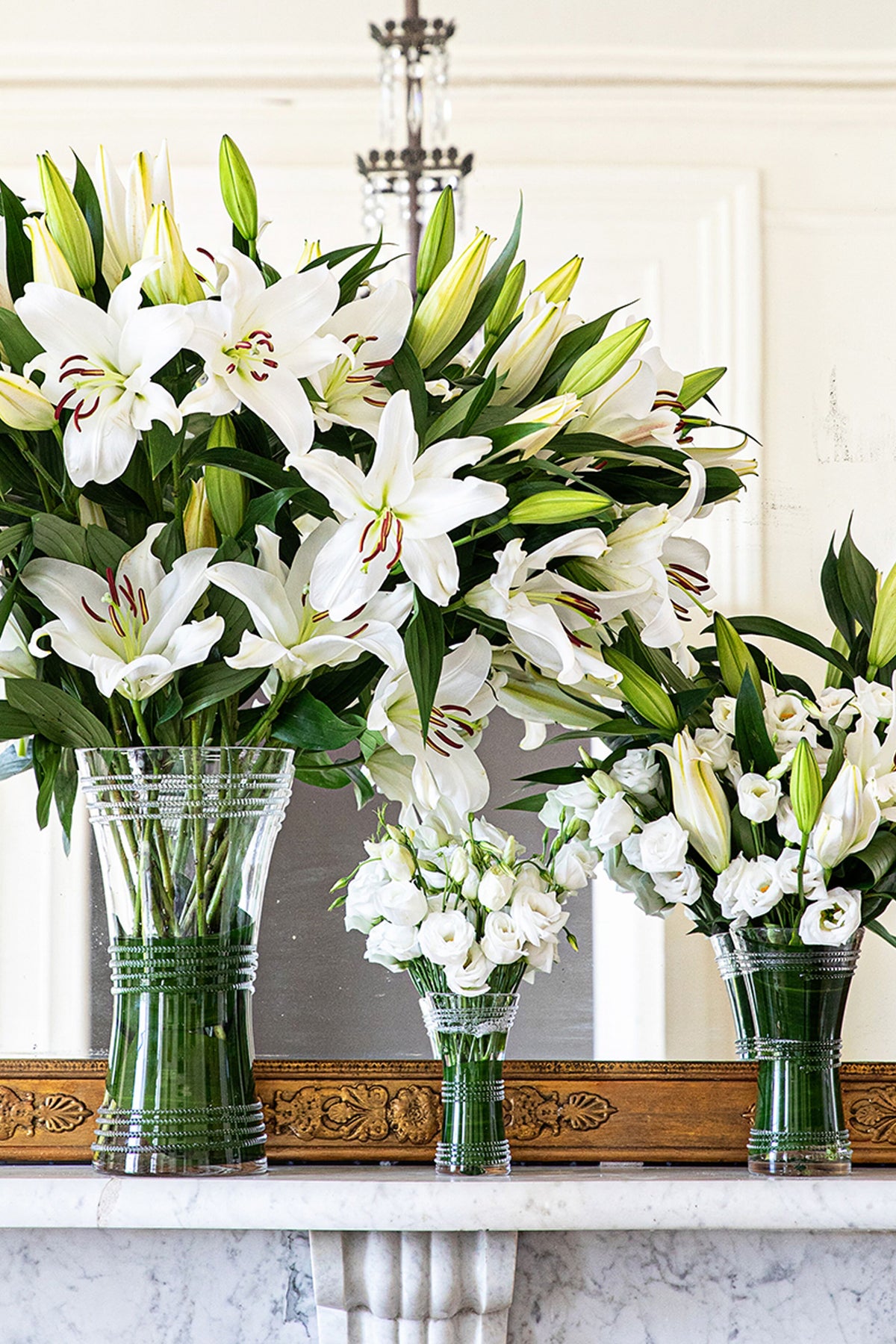 Ella 6 Corset Vase: A classic, high-end glass vessel showcasing white blooms, effortlessly enhancing any mantel arrangement with its fun, petite silhouette.