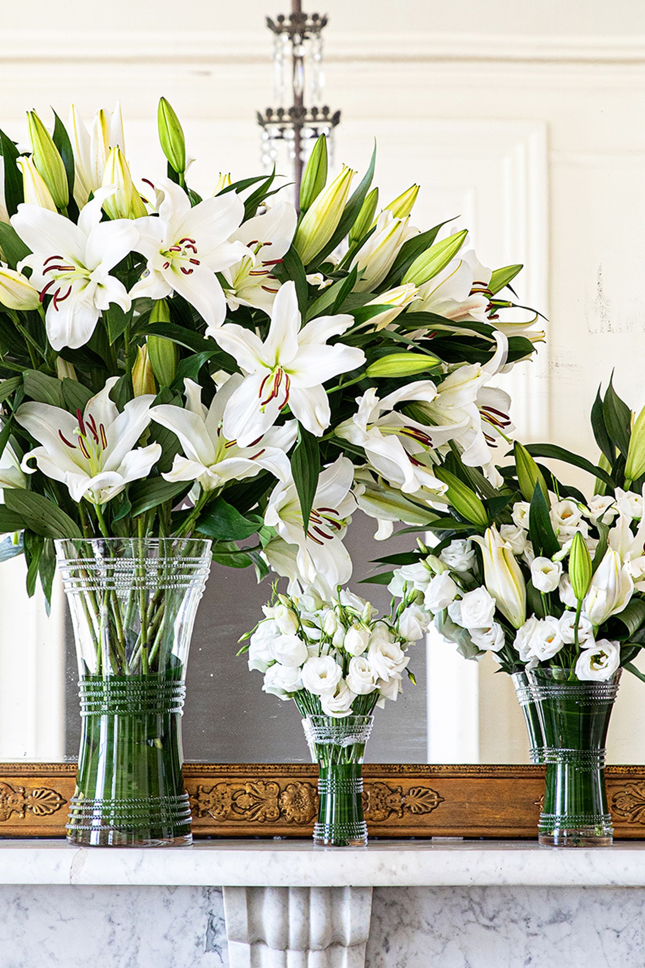 Ella 6 Corset Vase: A classic, high-end glass vessel showcasing white blooms, effortlessly enhancing any mantel arrangement with its fun, petite silhouette.