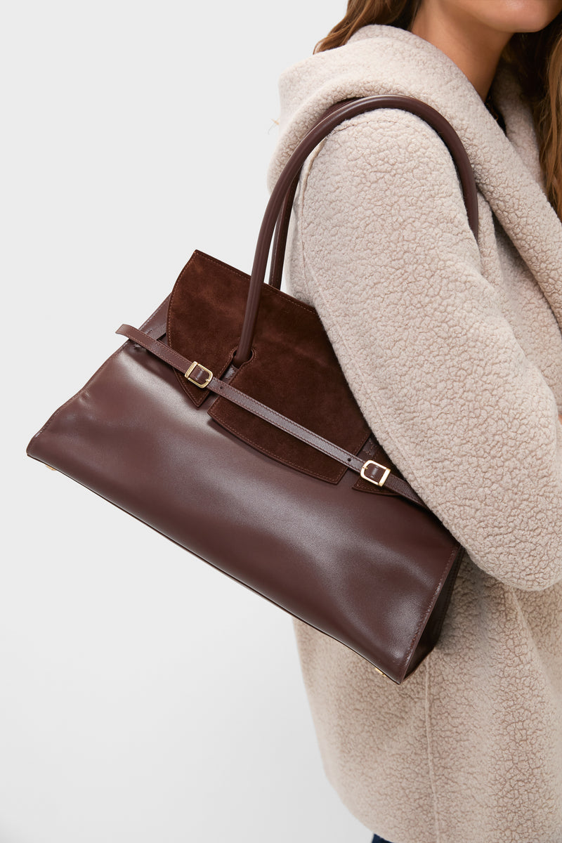 Model showcasing the Hickory River Suede Shoulder Bag—a classic, high-end accessory with a suede flap and slim belt detail, offering effortless, versatile style for any occasion.
