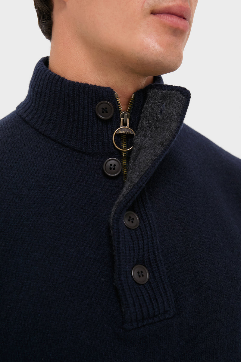 Navy Essential Patch Half Zip Knitted Jumper showcases a classic ribbed collar, effortless quarter-zip, button placket, and leather elbow patches, combining high-end style with a fun, cozy vibe.