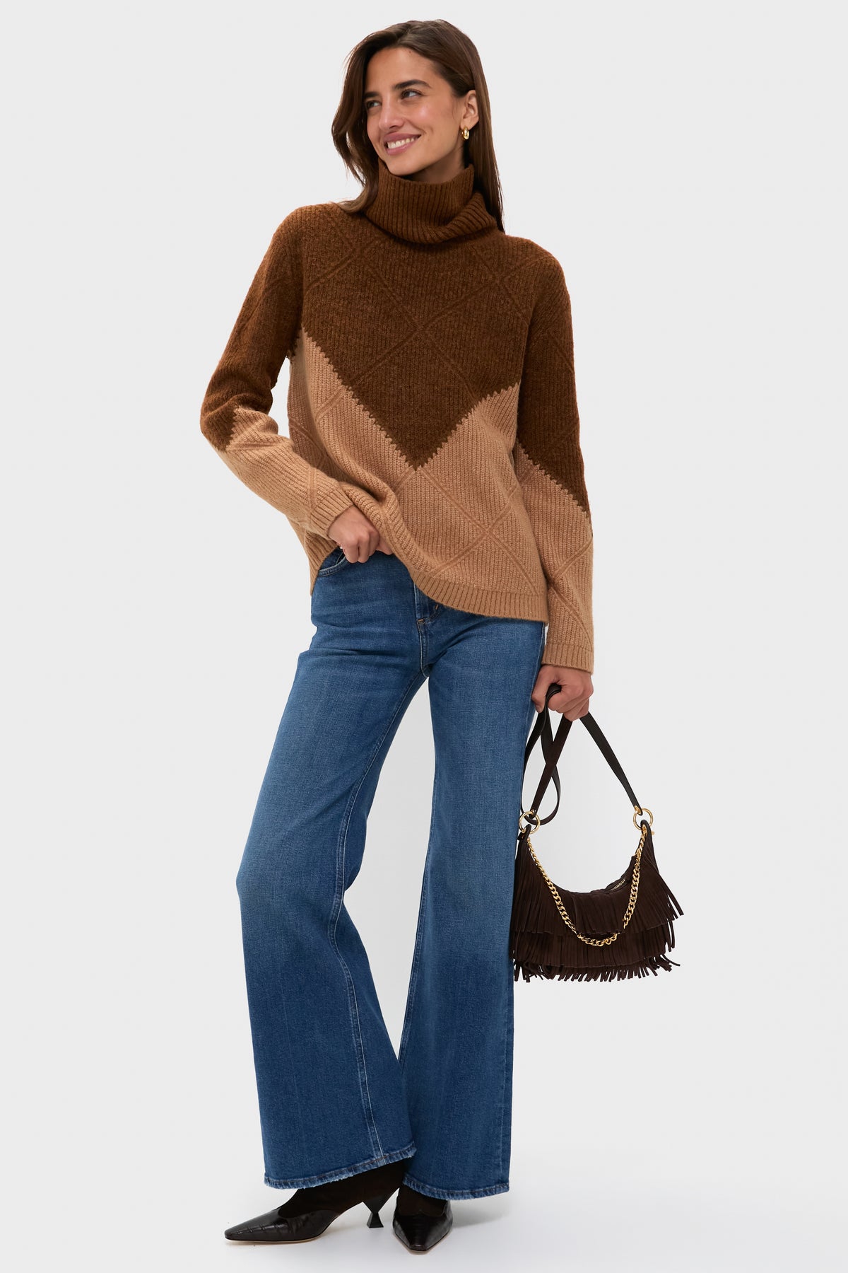 Young adult wearing the Tan & Brown Diamond Demi Turtleneck, showcasing a classic, effortless, and fun fall look with a high-end finish.